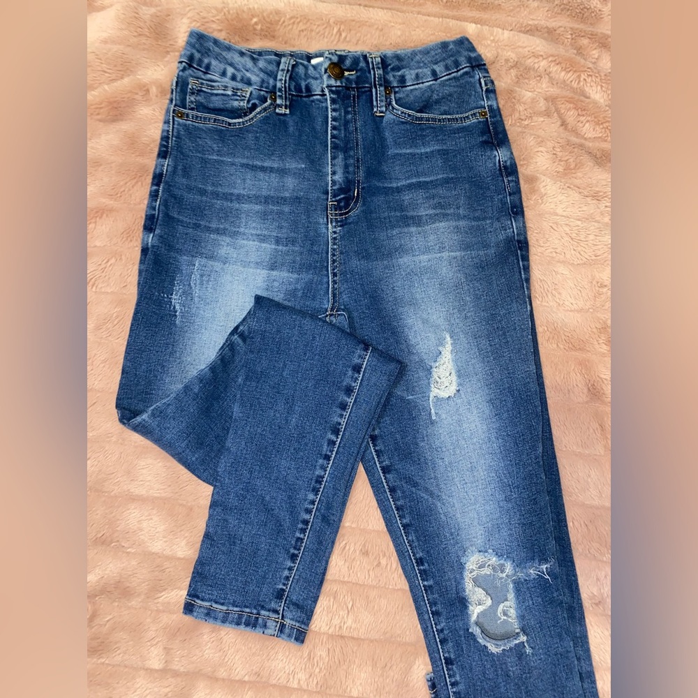 Ripped blue skinny jeans